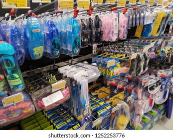 Kuala Lumpur, Malaysia - 29 November 2018 : Interior View Of Swim Plastic Goggles Accessories Hanging For Sell In The Supermarket. 