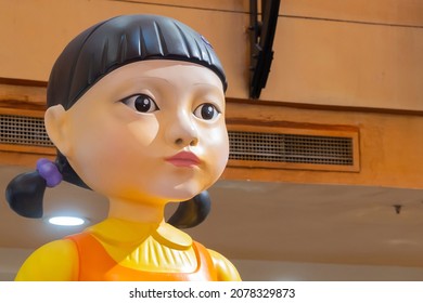 KUALA LUMPUR, MALAYSIA - 31 OCTOBER, 2021 : Giant Doll from Squid Game at the roadshow for the promotion of new Netflix show. Squid Game is a South Korean survival drama television series