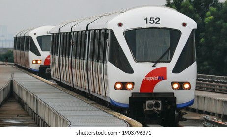 Kuala Lumpur, Malaysia- 6 Oct 19: Two LRTs Of The Kelana Jaya Line Resting In USJ7 Station. 