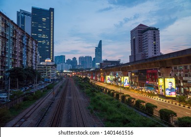 Kuala Lumpur, Malaysia - April 12th, 2019 : City Of Bangsar Landmark, Train KTM Railway, Overlooking Famous Menara TM Or TM Tower With Sunset Scene.