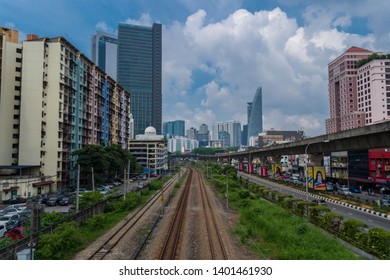 Kuala Lumpur, Malaysia - April 12th, 2019 : City Of Bangsar Landmark, Train KTM Railway, Overlooking Famous Menara TM Or TM Tower With Dramatic Blue Sky.