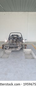 KUALA LUMPUR, MALAYSIA - APRIL  20, 2021 : Bare Prototype Car Frame Work Without Cover And Seating Cushion