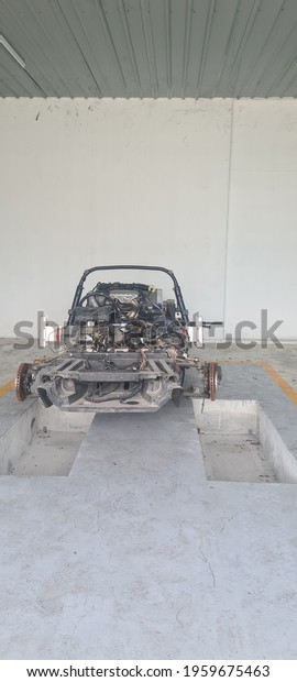 KUALA LUMPUR, MALAYSIA\
- APRIL  20, 2021 : Bare prototype car frame work without cover and\
seating cushion