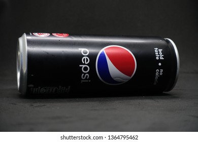 Kuala Lumpur, Malaysia - April 2019. A Can Of Pepsi Black Against Isolated Black Background, A Zero Calories Carbonated Drink, Healthier Choice