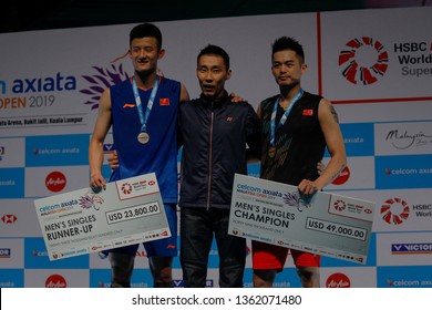 KUALA LUMPUR, MALAYSIA - APRIL 7, 2019 : China Men's Singles, Lin Dan, Cheng Long and Lee Chong Wei after winning in CELCOM AXIATA Malaysia Open 2019 at the Axiata Arena in Bukit Jalil, Malaysia.