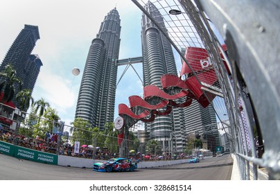 KUALA LUMPUR, MALAYSIA - AUGUST 09, 2015: Chaz Mostert From The Pepsi Max Crew Team Races In The V8 Supercars Street Challenge At The 2015 Kuala Lumpur City Grand Prix.