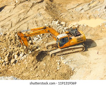 Kuala  Lumpur, Malaysia - August 12,2018 : Close up  of industrial excavator working on construction site. Selective focus and crop fragment