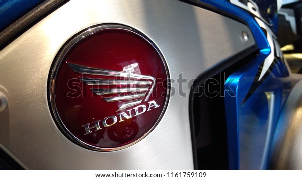 Kuala Lumpur, Malaysia - August 20,\
2018 : Honda logos at the motorcycle body. Honda is one of the\
famous motorcycle manufacture in the world from Japan. \
