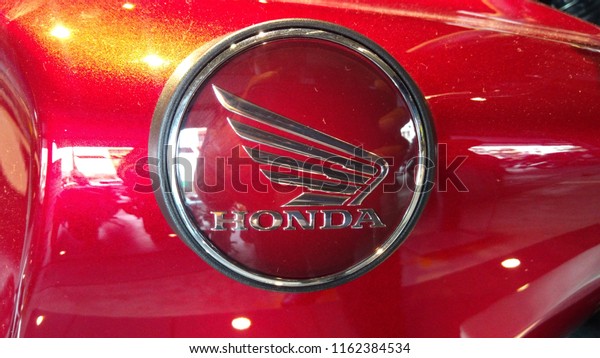 Kuala Lumpur, Malaysia - August 20,\
2018 : Honda logos at the motorcycle body. Honda is one of the\
famous motorcycle manufacture in the world from Japan. \
