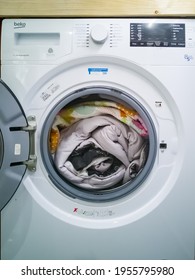 Kuala Lumpur, Malaysia - August 2019 : Free-standing Beko Washing Machine Loaded With Comforter.  Beko Brand, Turkish Domestic Appliance And Consumer Electronics Brand Of Arcelik