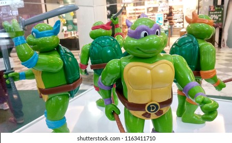 KUALA LUMPUR, MALAYSIA -AUGUST 23, 2018: Selected focused of fictional action figure character TEENAGE MUTANT NINJA TURTLE. Displayed by collector on desk for public. 
