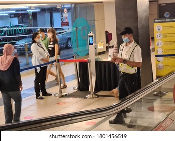 Kuala Lumpur / Malaysia - August 24th 2020: Covid-19 inspection before customer entering Midvalley Shopping Mall