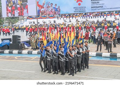 Kuala Lumpur, Malaysia - August 29 2022 : Malaysian Teenagers Performing The Colour Guard Routine During Rehearsal Of 65th Malaysia National Day Ceremony At Dataran Merdeka In Kuala Lumpur, Malaysia.