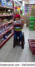 KUALA LUMPUR, MALAYSIA - CIRCA 2018: Portrait Of Handsome Male Asian Student With Deference Expression Face At Supermarket In Kuala Lumpur, Malaysia. Blur  