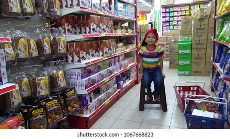 KUALA LUMPUR, MALAYSIA - CIRCA 2018: Portrait Of Handsome Male Asian Student With Deference Expression Face At Supermarket In Kuala Lumpur, Malaysia. Blurr