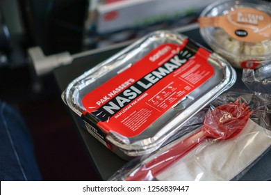 Kuala Lumpur, Malaysia - Circa December, 2018: The AirAsia Inflight Meal, Nasi Lemak Pak Naseer By AirAsia Santan. Selected Focus