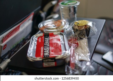 Kuala Lumpur, Malaysia - Circa December, 2018: The AirAsia Inflight Meal, Nasi Lemak Pak Naseer By AirAsia Santan. Selected Focus