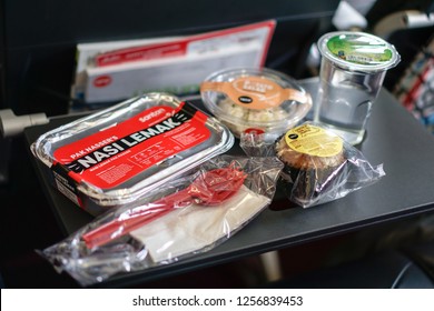 Kuala Lumpur, Malaysia - Circa December, 2018: The AirAsia Inflight Meal, Nasi Lemak Pak Naseer By AirAsia Santan. Selected Focus