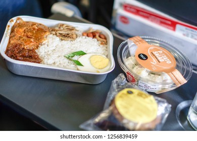 Kuala Lumpur, Malaysia - Circa December, 2018: The AirAsia Inflight Meal, Nasi Lemak Pak Naseer By AirAsia Santan. Selected Focus