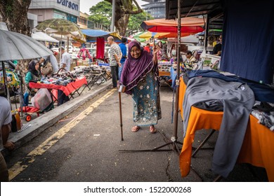 Kuala Lumpur, Malaysia -Circa September 2019 : Pudu Wet Market On Sunday. An Old Malay Woman Begging For Money