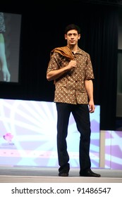 KUALA LUMPUR, MALAYSIA - DEC 10: A model displays creation by Asmoro Damais from Indonesia during Kuala Lumpur International Batik (KLIB2011) fashion show on December 10, 2011 in Kuala Lumpur,Malaysia