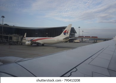 Kuala Lumpur, Malaysia - December 20, 2017 :View From Aircraft Windows Malaysia Airline Plane Touch Down At Kuala Lumpur International Airport, Malaysia. Malaysia Airline Is National Airline.