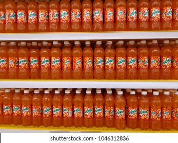 Kuala Lumpur Malaysia, Feb 18, 2018. Monotonous Display Of Orange Drinks To Create Maximum Impact Product Exposure.