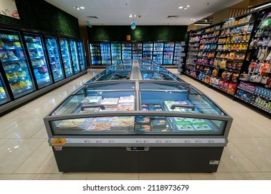 KUALA LUMPUR, MALAYSIA - FEBRUARY 05, 2022: Various brands and type of frozen foods on shelves in a supermarket. Consumption of frozen food has increased mostly due to people's busy lifestyle.