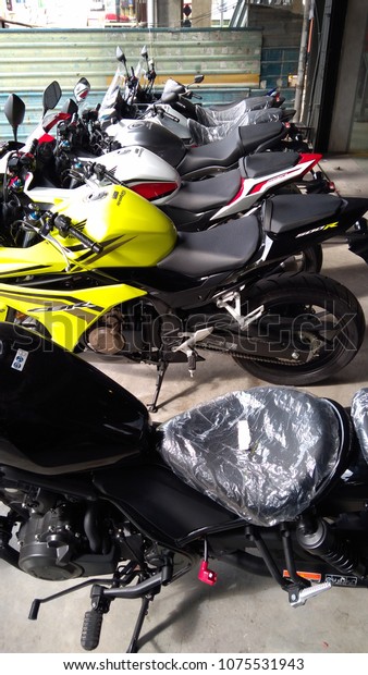 Kuala Lumpur,\
Malaysia - February 6, 2018 : New motorcycles of Honda brand is on\
sale in motorcycle shop. \
