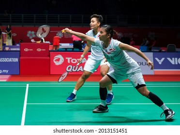 KUALA LUMPUR, MALAYSIA - JANUARY 09, 2020: Greysia Polii and Apriyani Rahayu of Indonesia in action during womens doubles badminton tournament, Perodua Malaysia Masters 2020 at the Axiata Arena.
