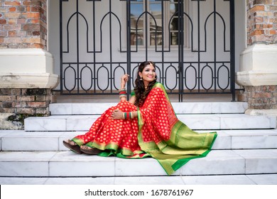 Kuala Lumpur, Malaysia – January 2020: Beautiful girl wearing traditional India costume lehenga choli or saree with kundan jewelry. Deepavali celebration and Bollywood concept
