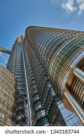 Kuala Lumpur, Malaysia- July 06, 2014: The Petronas Twin Towers, Designed By Argentine Architect César Pelli. A Detail Shot Looking Up.