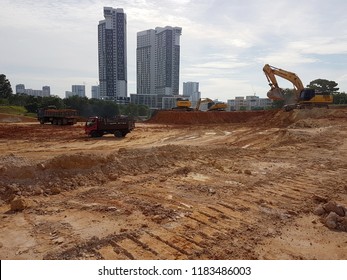 KUALA LUMPUR, MALAYSIA -JULY 07, 2017: Heavy machinery doing earthwork at the construction site. Works carried out before building construction starts to get required levels. 