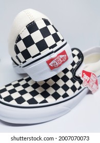 KUALA LUMPUR, MALAYSIA - JULY 13 2021: A Pair Of Vans Checkerboard Slip-on Shoes Style In With Clean Background