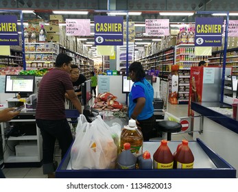 Kuala Lumpur, Malaysia : July 13th 2018 - Customers Queue Up And Paid For The Things And Goods Bought At Hyper Market In Malaysia