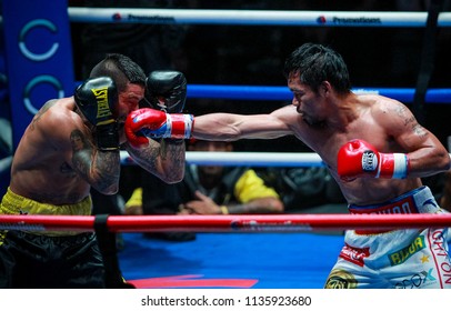 KUALA LUMPUR, MALAYSIA - JULY 15, 2018 : Philippines' Manny Pacquiao (R) Fights Argentina's Lucas Matthysse During Their World Welterweight Boxing Championship At Axiata Arena In Kuala Lumpur.