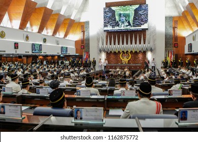 KUALA LUMPUR, MALAYSIA - JULY 17, 2018. Members of Parliament meeting during the opening of Dewan Rakyat session at the building of Parliament of Malaysia in Kuala Lumpur. Low light photography.