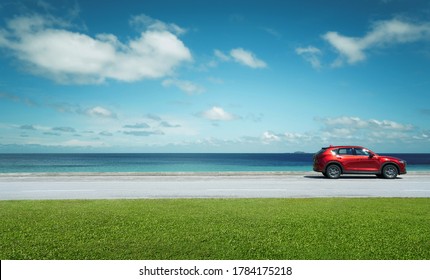Kuala Lumpur, Malaysia - July 21, 2020 : New red Mazda CX 5 crossover SUV park at seacoast with beautiful day. Mazda CX 5 is one of Malaysian favorite SUV car .