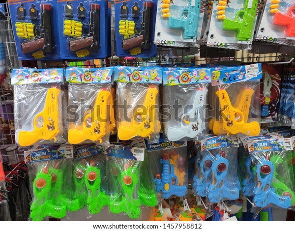 KUALA LUMPUR, MALAYSIA -JULY 21,\
2019: Children\'s toys are hung and exhibited to customers. Good\
design packaging. Sorted by type and labelled with a\
price.\
