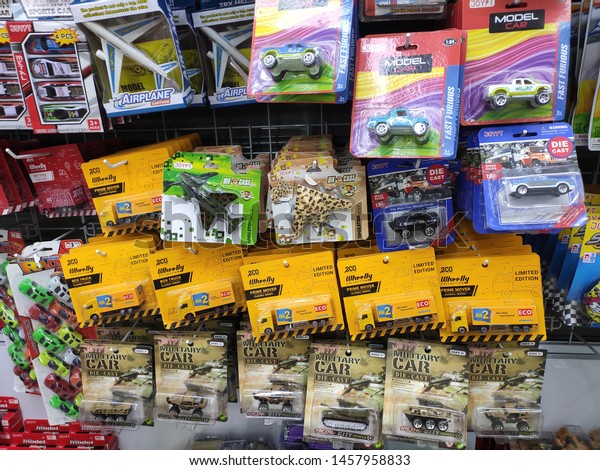 KUALA LUMPUR, MALAYSIA -JULY 21,\
2019: Children\'s toys are hung and exhibited to customers. Good\
design packaging. Sorted by type and labelled with a\
price.\
