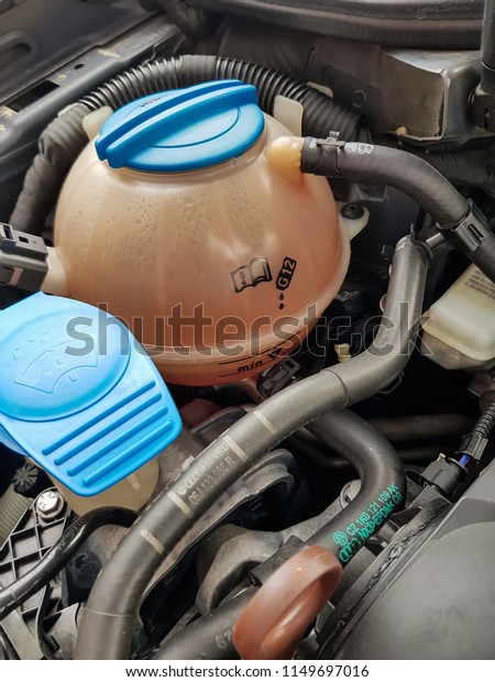 KUALA LUMPUR, MALAYSIA - JULY 3, 2018:\
Close-up of Coolant tank from Volkswagen\
Car