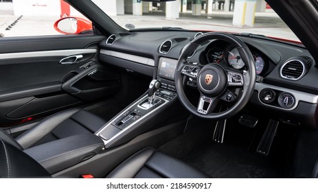 Kuala Lumpur, Malaysia - July 31 2022 - Porsche Cayman Red In KL City