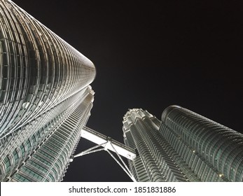 Kuala Lumpur, Malaysia - June 11, 2016: Looking Up To The KLCC Twin Towers At Different Angle At Night