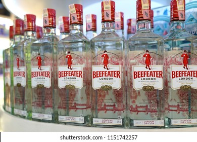 KUALA LUMPUR, MALAYSIA - JUNE 24, 2018: Beefeater London dry gin bottles on store shelf in KLIA Airport. It is a brand of gin owned by Pernod Ricard and bottled and distributed in the United Kingdom.