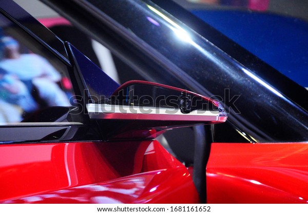 KUALA\
LUMPUR, MALAYSIA -MARCH 03, 2020: Car side mirror or door mirror\
build at exterior of car for the purposes of helping the driver see\
areas behind and to the sides of the\
vehicle.