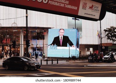 Kuala Lumpur, Malaysia - March 2, 2018: Russian President Vladimir Putin On The Big Screen In The Central Street Of KL
