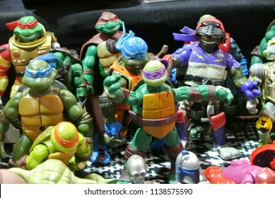 KUALA LUMPUR, MALAYSIA -MARCH 31: Selected focused of fictional action figure character TEENAGE MUTANT NINJA TURTLE. Displayed by collector on desk for public. 