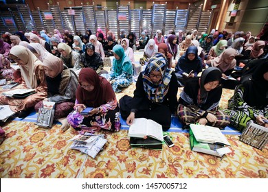 Kuala Lumpur, Malaysia - May 05,2019. A Muslim Group Sitting And Reading Quran During Quran Hour And 'Tadarus Al-Quran' Mosque,