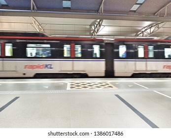 Kuala Lumpur / Malaysia - May 1 2019 : LRT , Monorail ,train Movement On Track Moving Fast Taken At Station Hang Tuah Stock Photo -image