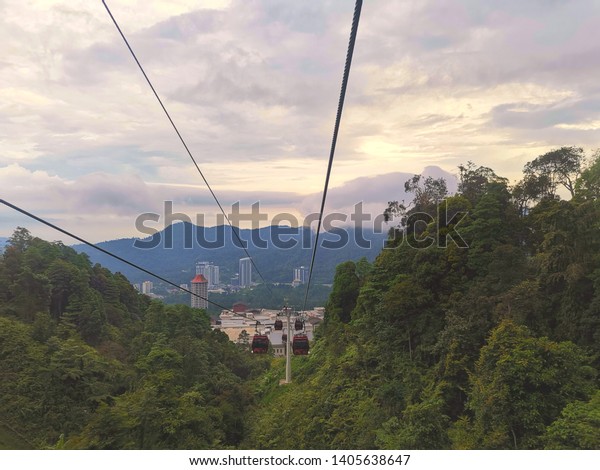 Kuala Lumpur,\
Malaysia- May 20, 2019: Awana sky cable car with nature view.  The\
cable car starts from Awana Station and ends in SkyAvenue Station\
in Genting Highlands.